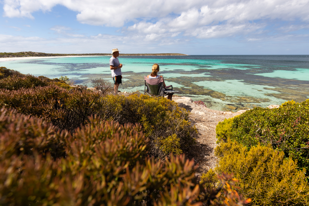 couple enjoying the view on their caravan adventure